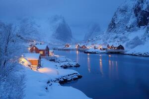 Traditional red rorbu houses illuminating a snowy evening in lofoten, norway photo