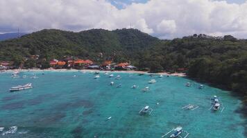 Traditional boats anchored in crystal clear waters of Lombok island video