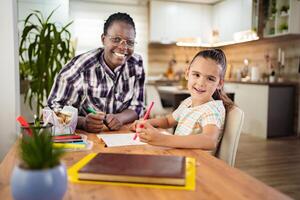 Creative moments between a joyful mentor and a young artist photo