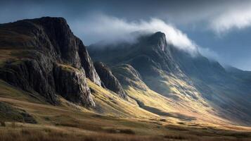 Dramatic Mountain Landscape with Clouds and Shadows photo