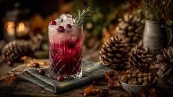 Cranberry Rosemary Cocktail with Ice in Rustic Setting photo
