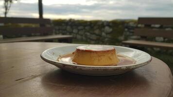 A dessert on a plate on a table photo