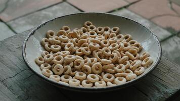 A bowl of cereal on a table photo