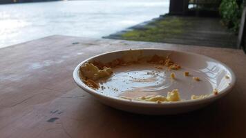A bowl of butter on a table photo