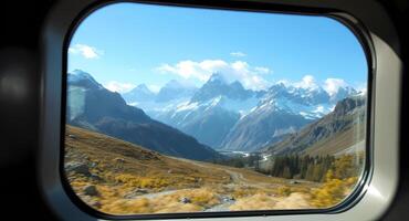 Mountain View From Train Window in Motion on Sunny Day photo