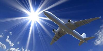 Airplane Flying High Above Clouds Bright Sunny Day photo