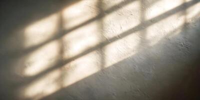 Light and Shadow on Textured Wall Window Pane Reflections photo