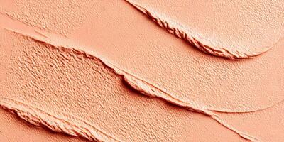 Peach Colored Cream Makeup Texture Swirl Background photo