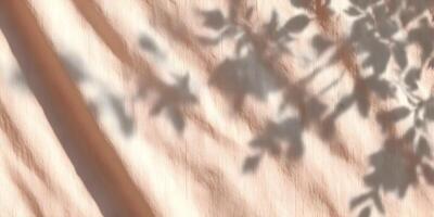 Peach Fabric Drape with Leaf Shadows Sunlight Texture photo