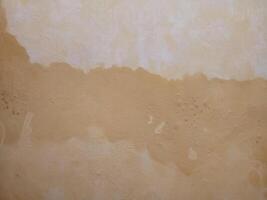 a wall with a brown stain on it photo