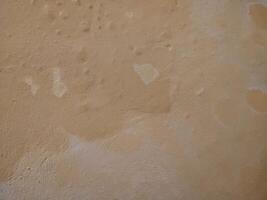 Close up of wall with some paint on it photo