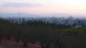 Timelapse panorama Tajikistan capital Dushanbe panorama from popular hilltop Victory park viewpoint with Tv tower, landmarks, buildings, real estate property development site video