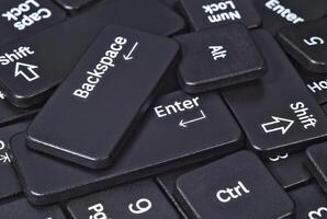 Heap of keyboard buttons closeup photo