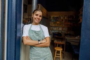 In a cozy cafe, a cheerful barista prepares drinks, creating a vibrant and warm atmosphere photo