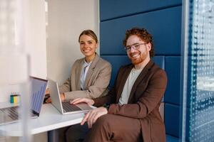Modern Business Partners Collaborating Together in a Stylish and Productive Workspace Environment photo