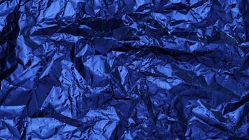 Deep Blue Crumpled Foil Texture Background with Reflective Highlights video
