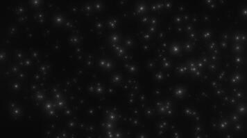 Animated background with glowing particles of stars in. Starry sky or space background. Seamless loop. video