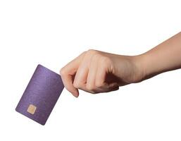 Hand holding a glossy, pearlescent bank card, showcasing modern technology for cashless payments and photo
