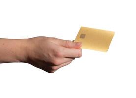 Bank card held in hand, showing a yellow and white plastic design with a chip. Customer using the photo