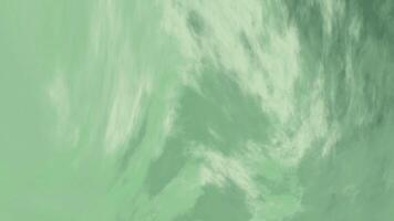 green background with soft cloud formations and flowing textures. Perfect for cinematic effects, dreamlike visuals, and modern digital design projects video
