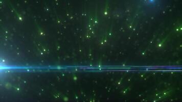 Vivid green light particles scattering through the dark, creating a lively and dynamic background effect video