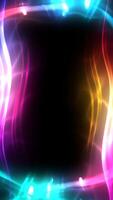 Colorful light waves creating dynamic frame against dark backdrop, forming vibrant abstract design with glowing, fluid motion. video