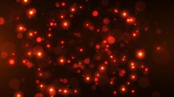 Flying particles animation concept for birthday and holiday celebration. 4k bokeh background with light particles rising on dark background. Animation footage video