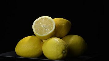 Lemons mountain gyrating with black background video