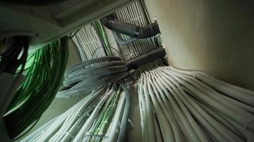 Organized network of electrical conduits and cables in utility room 2 video
