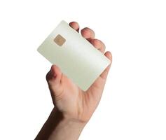 Hand holding a bank card, using it for an online payment or transaction. Glossy, pearlescent design photo