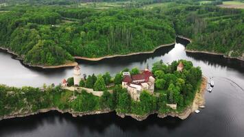 Aerial zoom orbiting view of castle Zvikov and Vltava and Otava rivers confluence in May 2025 in Czechia video