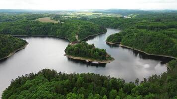 Aerial view of castle Zvikov and Vltava and Otava rivers confluence in May 2025 in Czechia video
