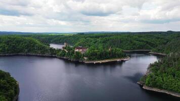 Aerial low view of castle Zvikov and Vltava and Otava rivers confluence in May 2025 in Czechia video