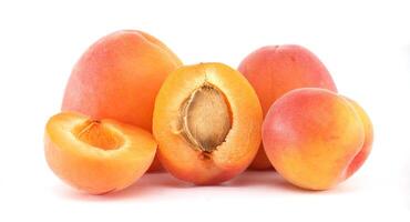 Fresh Vibrant Apricots Perfectly Displayed with Sliced and Whole Fruits photo
