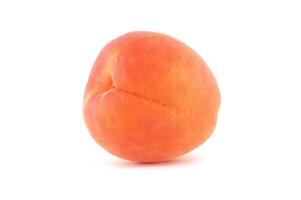 Close-Up of a Fresh Peach on a White Background Isolated photo