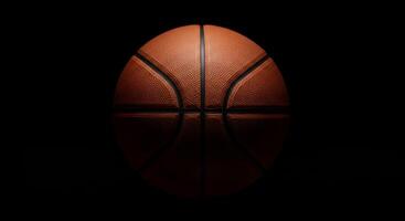 Dramatic Low-Key Studio Shot of a Basketball, Isolated on Black Background photo