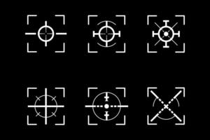 a set of four different crosshairs on a black background vector