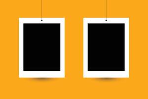 Two blank white frames hanging on a string vector