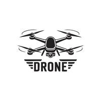 Drone quadcopter flying icon with camera in flat black illustration style vector