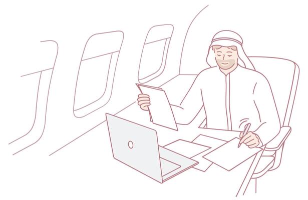 A Businessman Engaged in Work on His Laptop While Traveling on an Airplane High Above