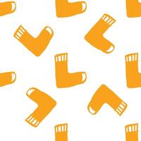 Seamless pattern of orange socks on white background vector