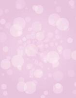Soft pink bokeh background with glowing light circles vector