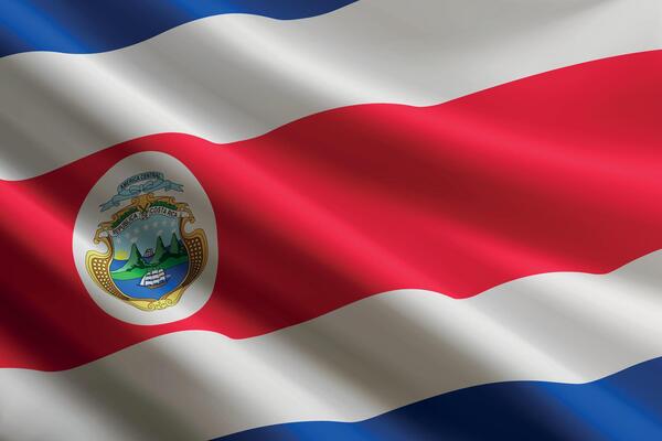 Costa Rica flag waving in the wind, detailed silk texture