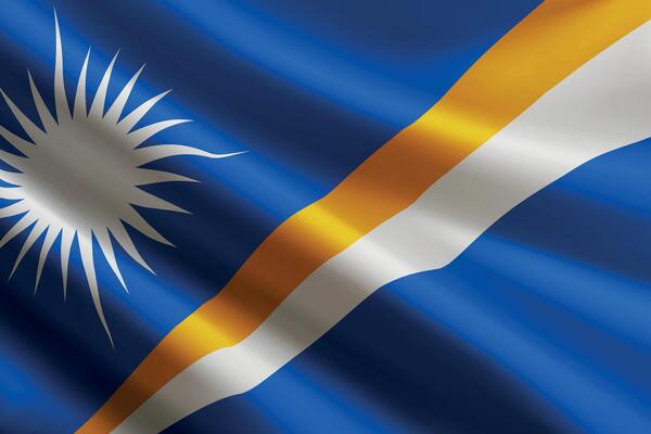 Marshall Islands flag waving in the wind, detailed silk texture