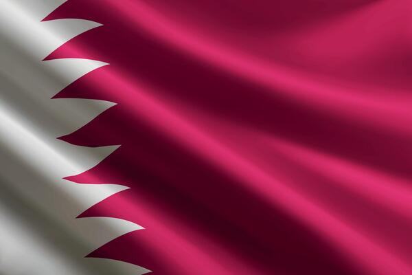 Qatar flag waving in the wind, detailed silk texture
