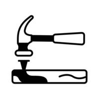 Get a sight of this latest glyph icon of nail fixing. vector