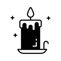 Grab this amazingly designed glyph icon showing candle. vector