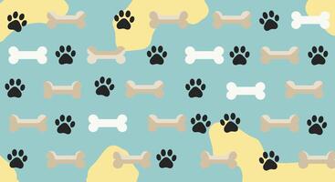 Dog bones and paw prints on a blue background vector