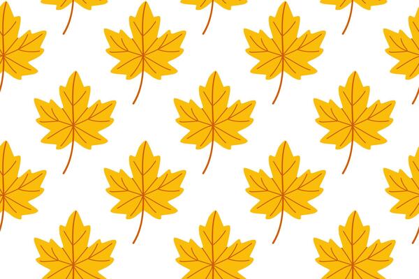Yellow maple leaf seamless pattern for fall backgrounds, seasonal branding and warm textile prints