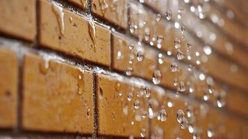 Close-Up of Raindrops Trickling Down a Weathered Brick Wall photo